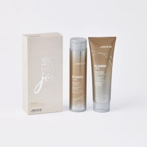 blonde life shampoo and conditioner bottles with a white gift box