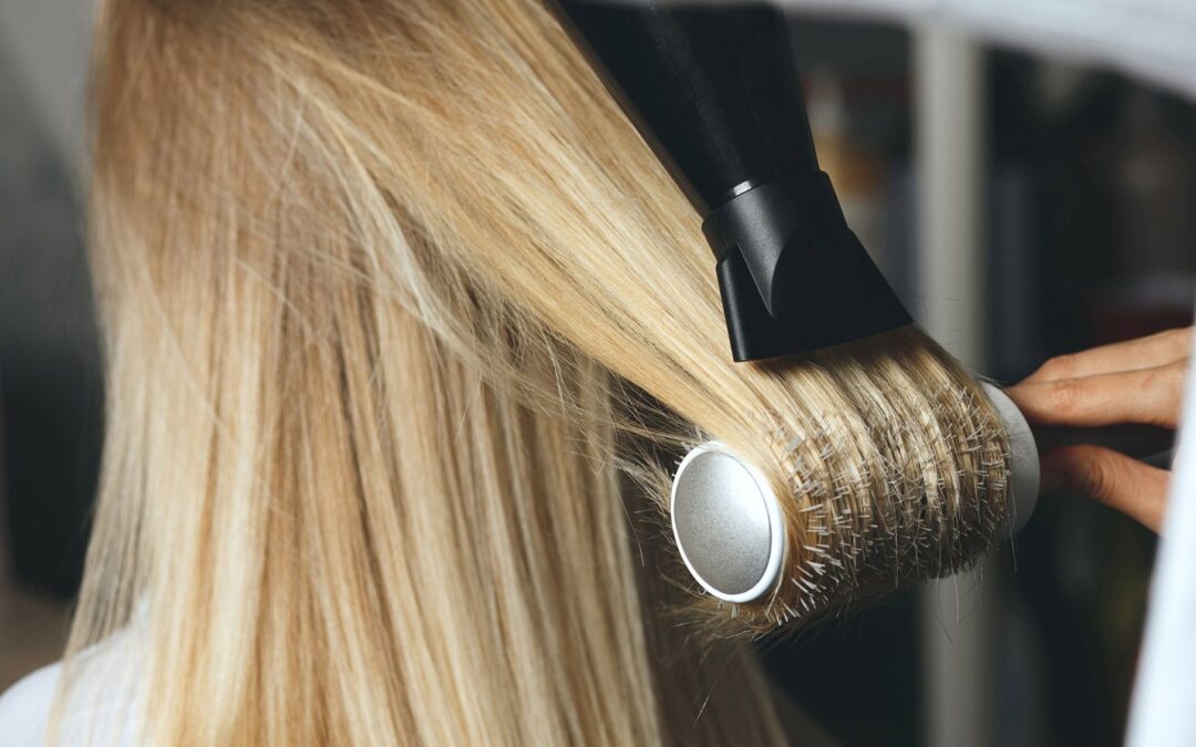 Salon blow-dry technique at ICONIC Hairdressing Evesham